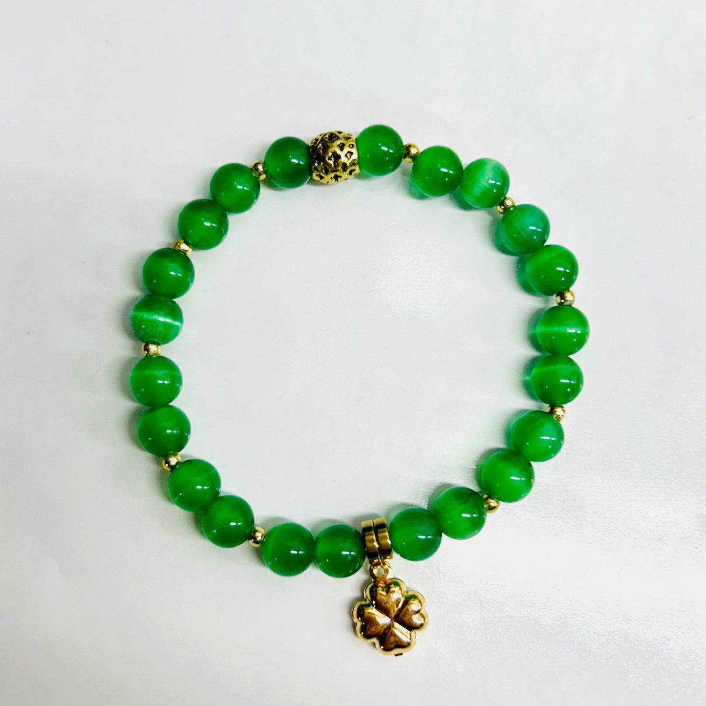 Beautiful green cat eye beads finished with the luck of the Irish ☘️